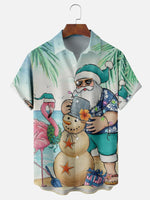 Santa Building Sand Snowman On the Beach with a Flamingo Short Sleeve Shirt, mens short sleeve shirts???¨¬o?big and tall mens shirts???¨¬o?short sleeve shirts for men???¨¬o?mens 4xl shirts???¨¬o?casual short sleeve shirts