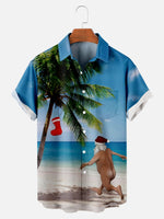 Men's Naked Santa Running on the Beach to a Christmas Stocking Palm Tree Short Sleeve Shirt ElevenOasis
