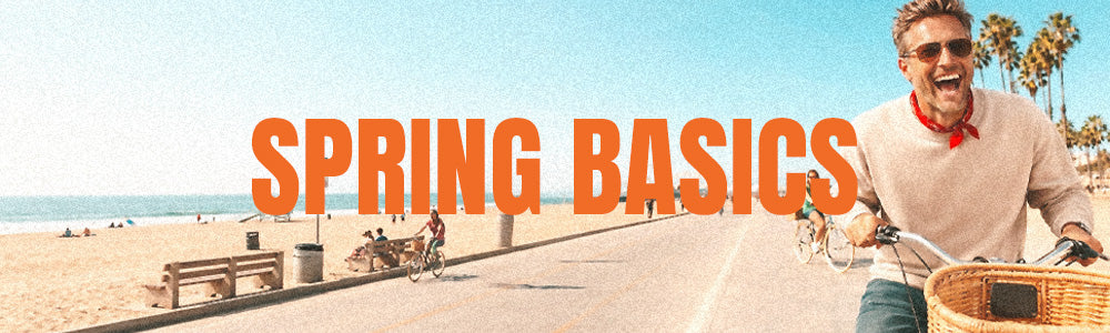 Man with a bicycle on a beach with 'Spring Basics' text overlay