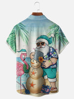 Santa Building Sand Snowman On the Beach with a Flamingo Short Sleeve Shirt, mens short sleeve shirts?¡§o?big and tall mens shirts?¡§o?short sleeve shirts for men?¡§o?mens 4xl shirts?¡§o?casual short sleeve shirts